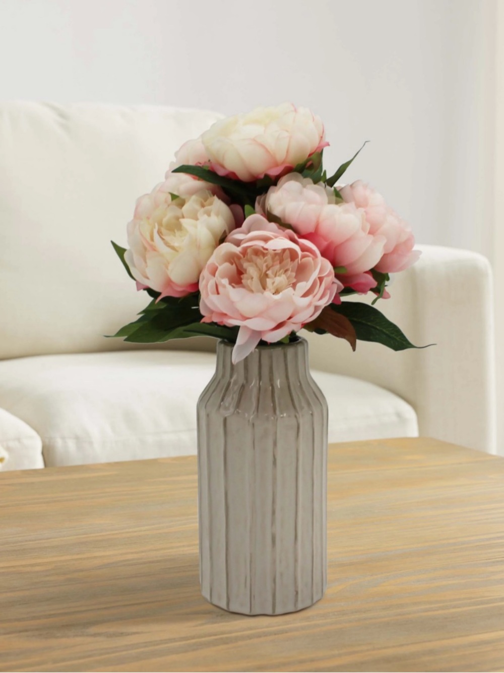 Faux pink Peonies in stoneware vase